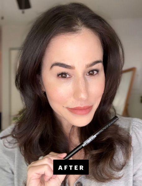 Marci Robin holding Urban Decay eyeliner