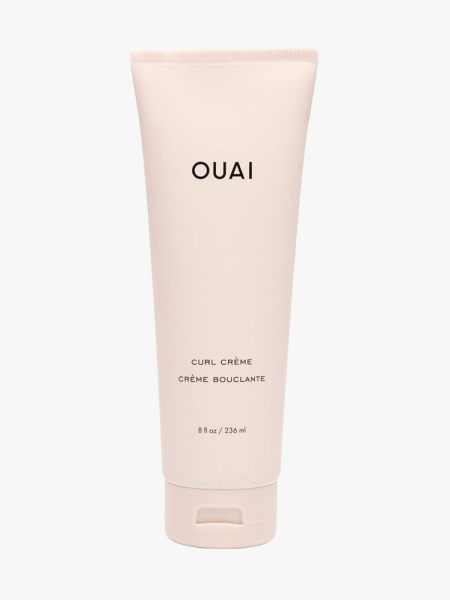Ouai Curl Crème light pink tube on light gray background