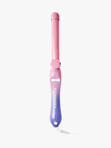 The Beachwaver Co. B1 Rotating Curling Iron in branded component on a light gray background