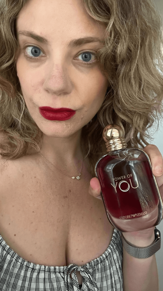 Allure contributor Kara Nesvig holding the Armani Power of You Eau de Parfum
