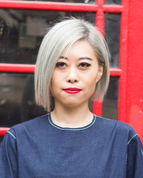 Woman with asymmetrical gray bob