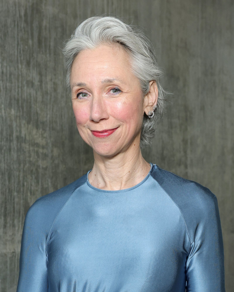 Alexandra Grant wearing a blue dress